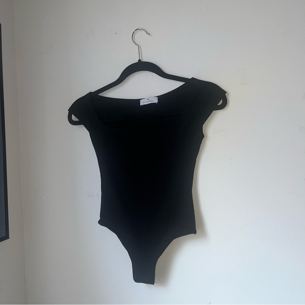 Gil Rodriguez el tigre bodysuit